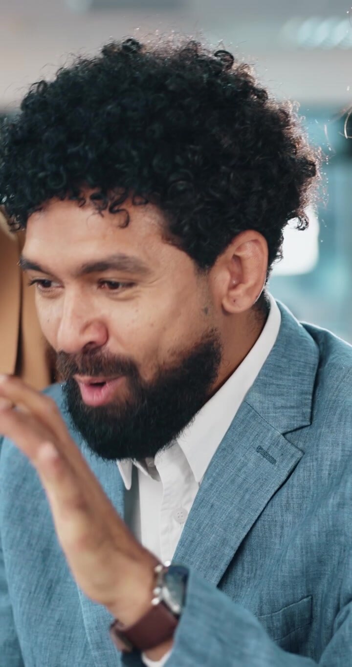 Professional Man Discussing Ideas During Office Meeting