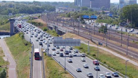 Aerial-View-Of-Bumper-to-Bumper-Highway-Traffic-Jam-In-A10-Highway-Around-Amsterdam,-The-Netherlands