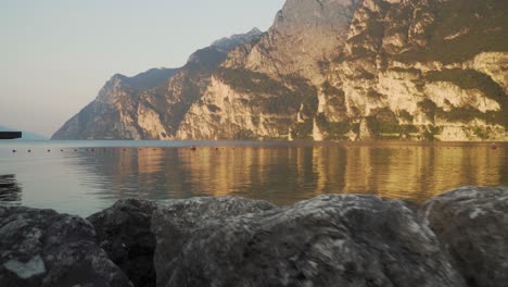 riva del garda beach with garda lake at sunrise