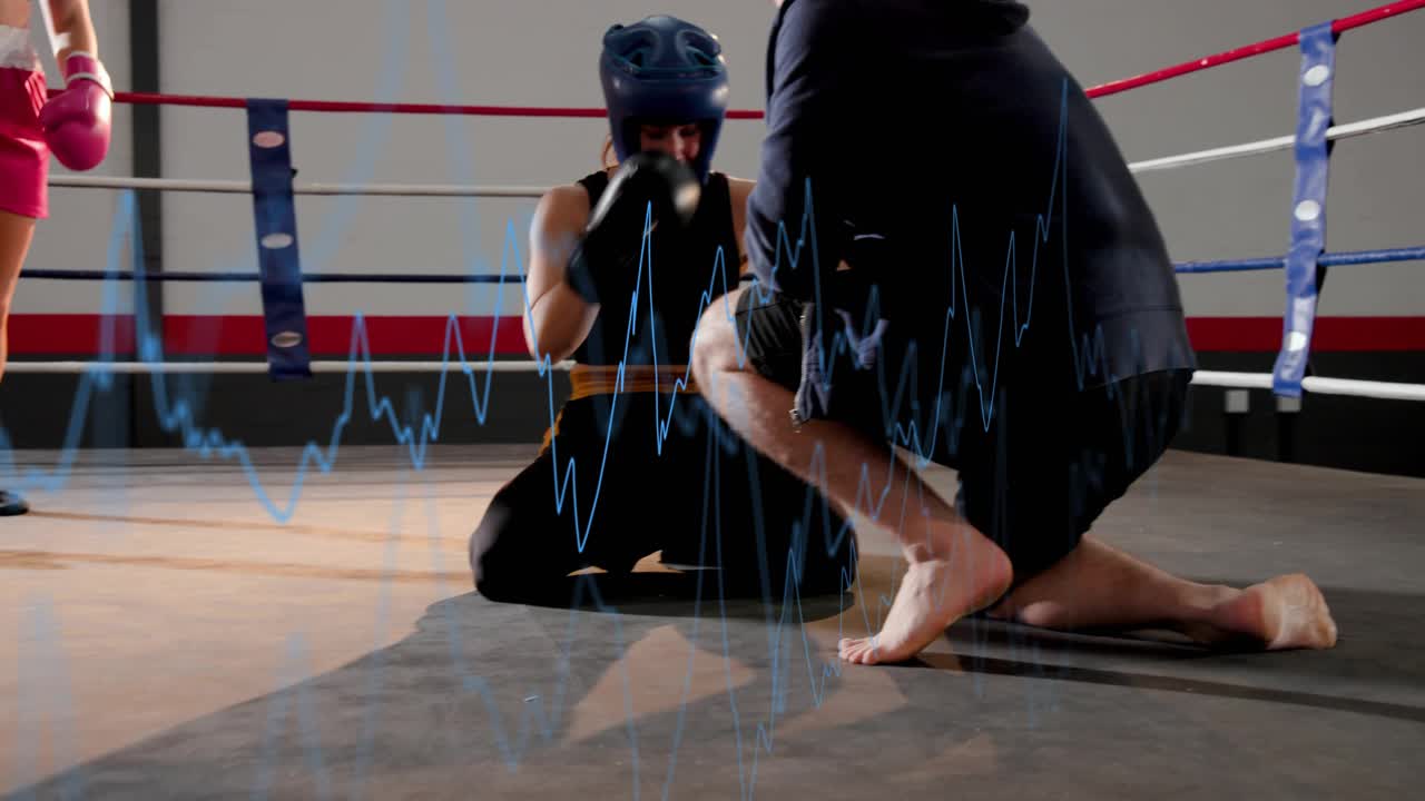 Boxer in blue headgear dropping to knees after hit, coach assessing, waveform running across ring