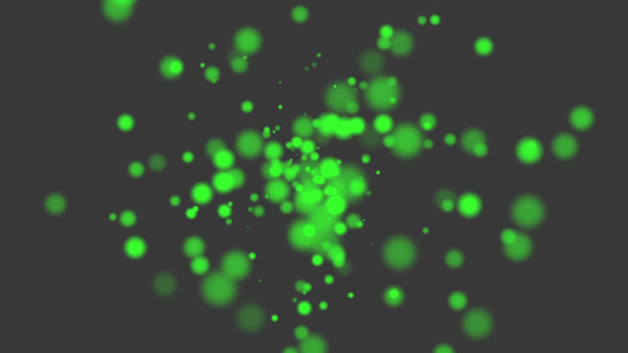 Fly and falling green round particles with glitters on black gradient