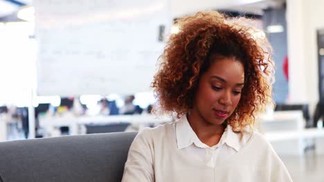 Businesswoman-smiling-in-office