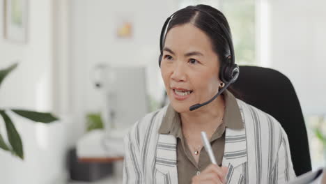 Asian-woman,-call-center-and-documents-in-virtual