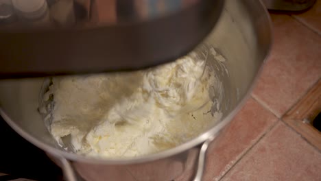 making and beating the cake frosting