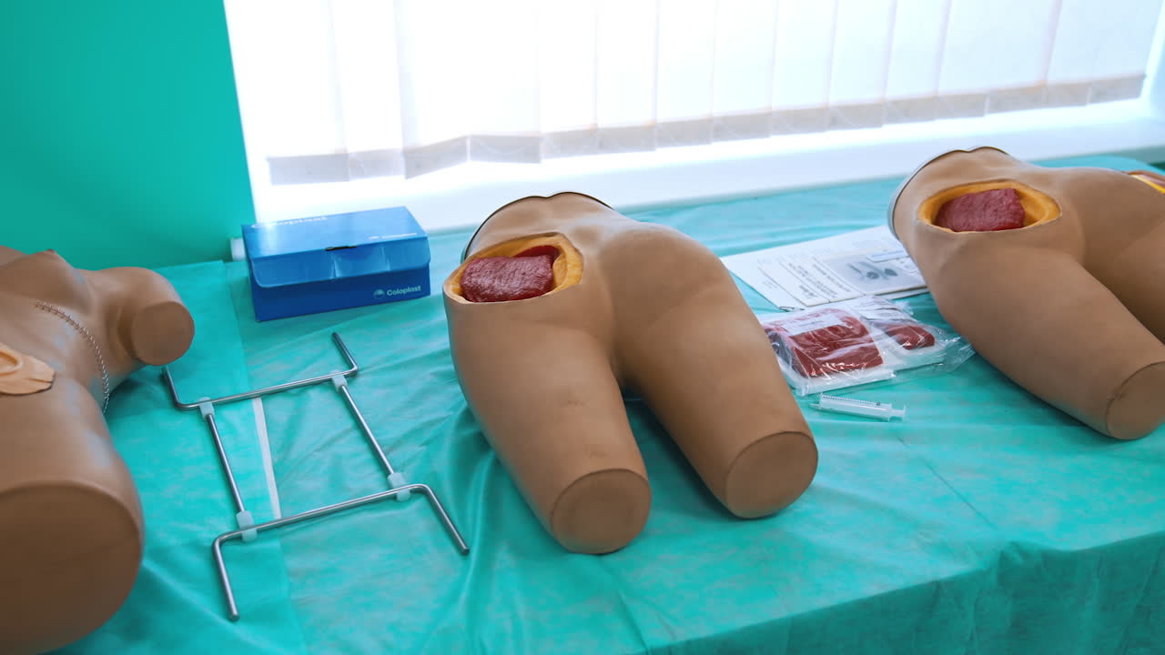 Hospital emergency room model. Dummy patient testing equipment at clinical skill centre