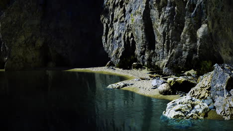 rocky shoreline next to calm water reveals natural beauty in serene location