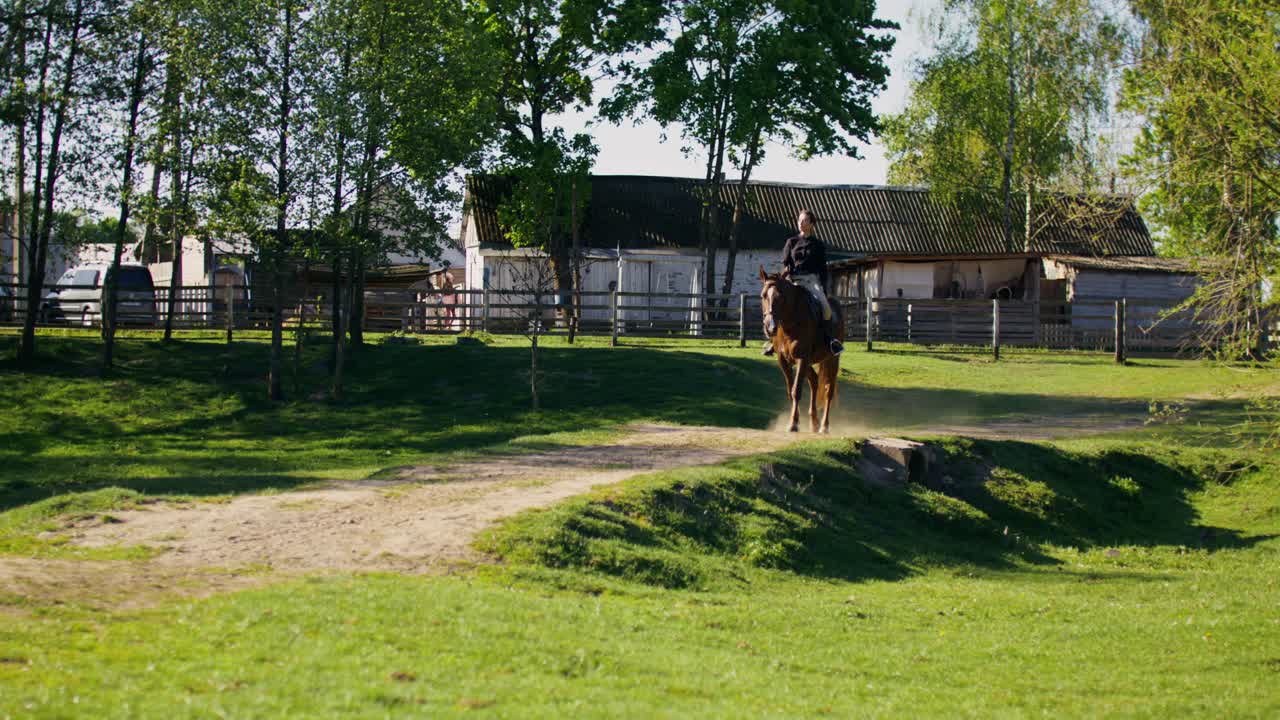 Woman Riding Horse on a Farm