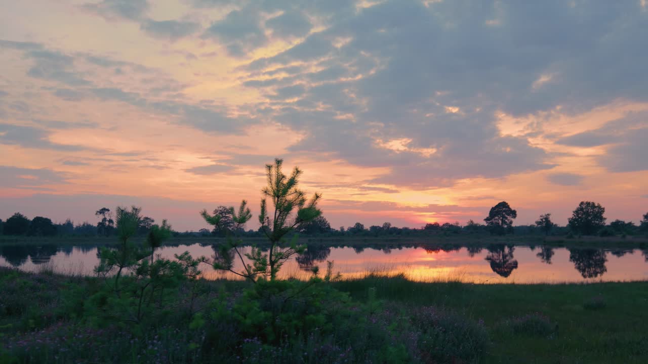 Sunset over a tranquil lake