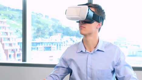 Male executive using virtual reality headset 4k