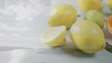 blending animation of lemons and sky over serene coastal landscape