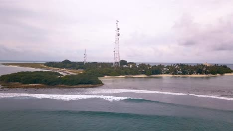 Drone-shots-of-the-Maldivian-island-Thuslusdhoo,-near-the-capital-Male,-Maldives