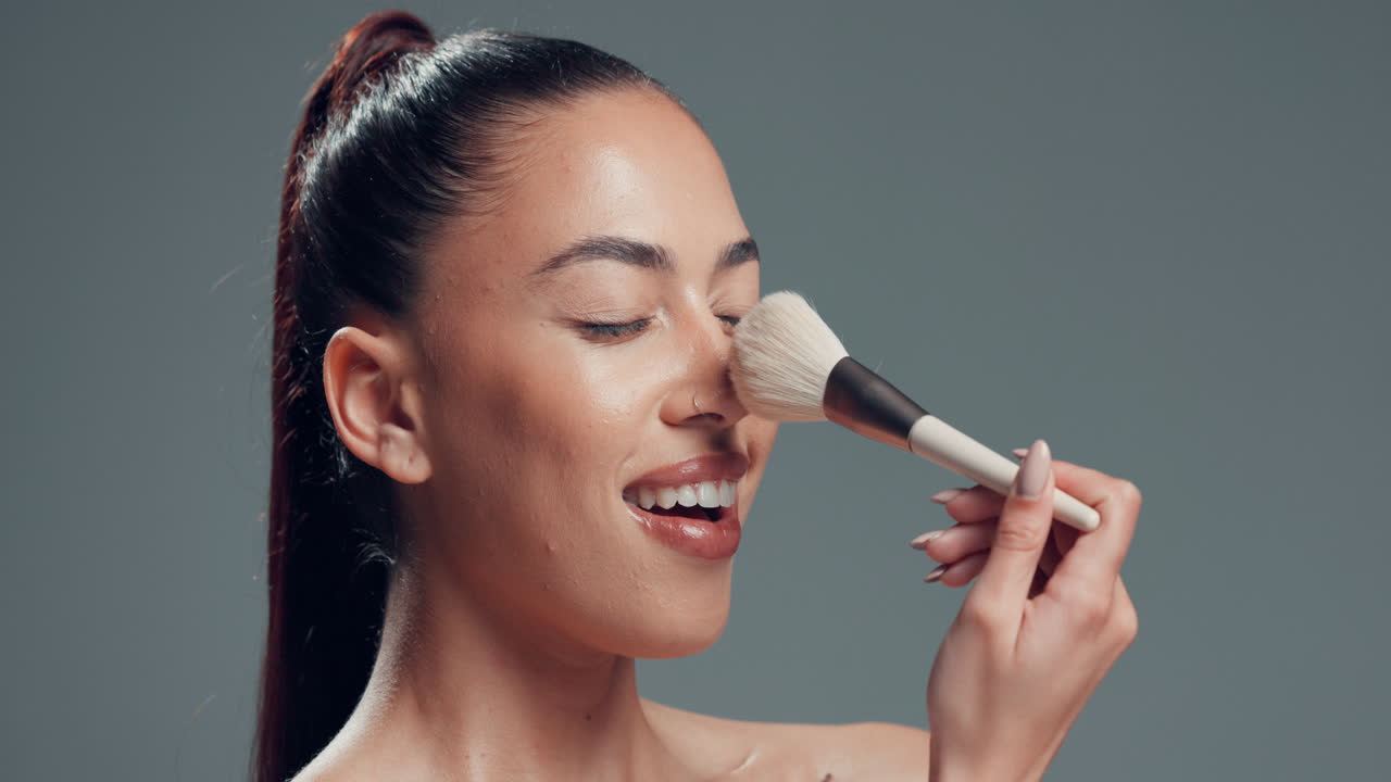 Woman Applying Makeup with Brush