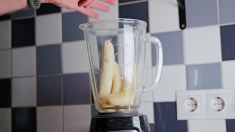 peeled banana falls in slow motion inside old soviet-era apartment kitchen, 4k