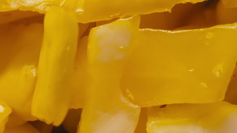 close-up of fermented yellow cabbage on plate. preservation of vegetables in glass jars. fermentation preserved vegetables. sauerkraut with spices.