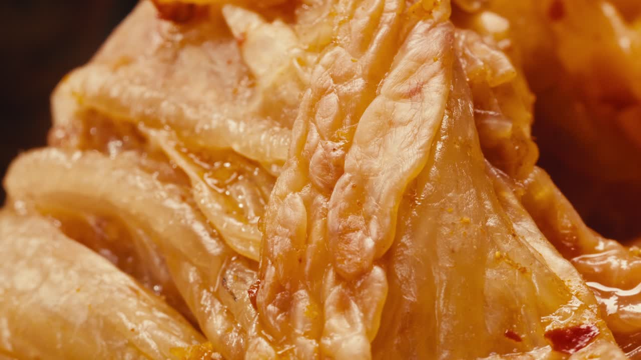 Close-up of texture fermented spicy cabbage kimchi with in can. Preservation of vegetables in glass jars. Fermentation preserved kimchi cabbage with spices macro. Asian cuisine.