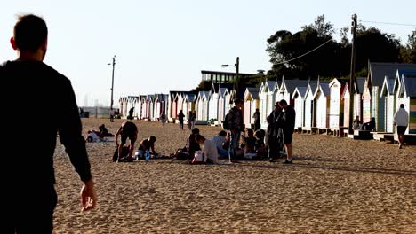 group of people relaxing on brighton beach