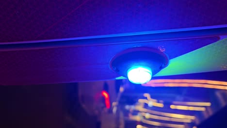 vertical video: a flashing ambulance light for emergency service at night