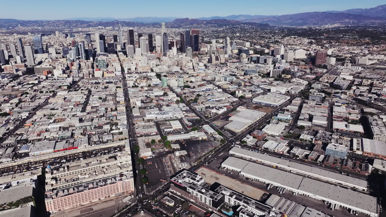 Aerial View of a Sprawling Cityscape with Skyscrapers, Likely Downtown Los Angeles