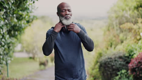 nature, headphones and senior black man running