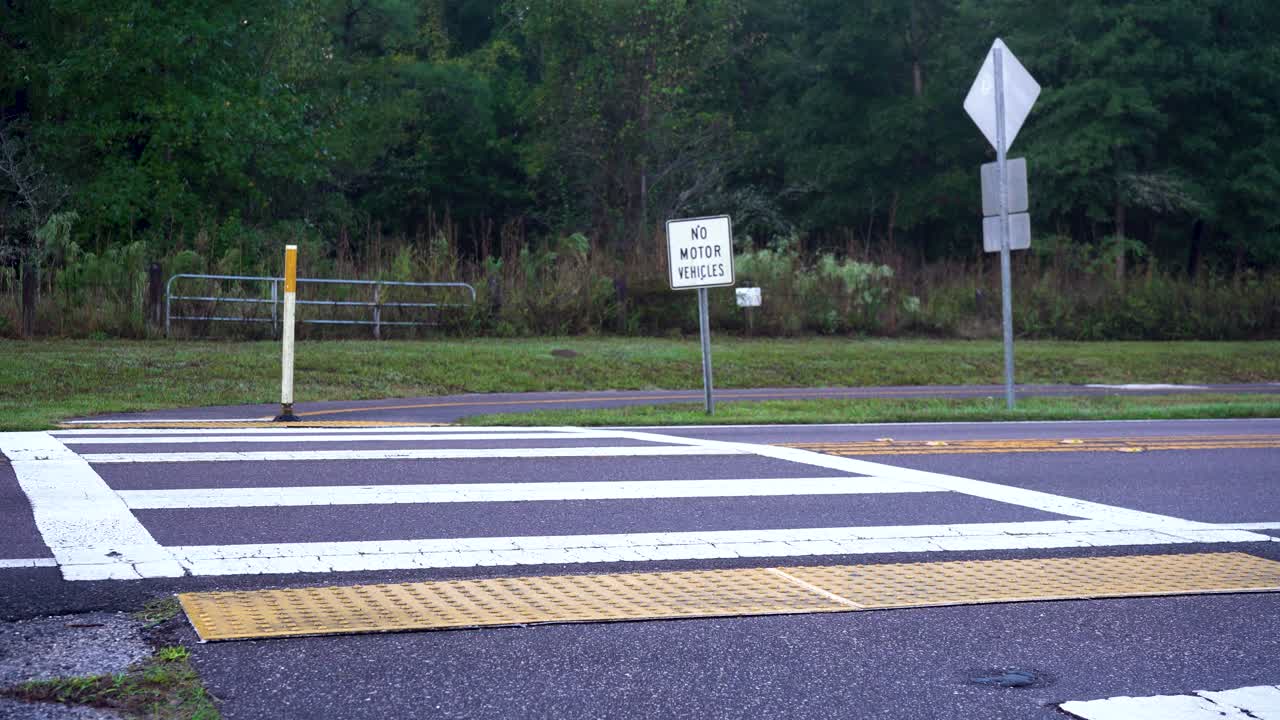 Crosswalk at Intersection between paved bike trail and road in Florida