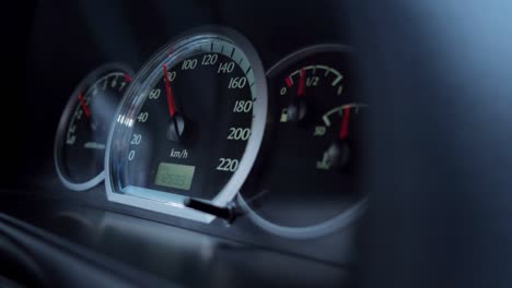 red arrow of speedometer of grey and black colours rises