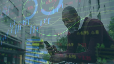 Animation-of-statistical-data-processing-over-happy-african-american-man-using-smartphone-on-street