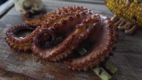 Grilled-whole-fresh-octopus-in-Mazatlan,-Sinaloa-Mexico-served-with-vegetables