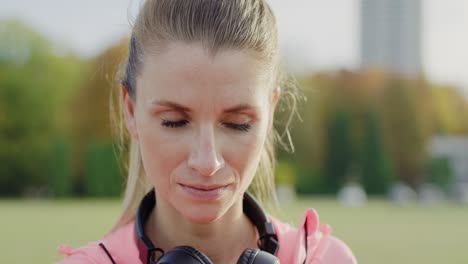 Handheld-view-of-woman-checking-how-many-calories-she-burned