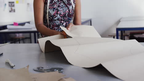 mixed race woman working in creative office