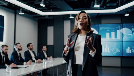 Businesswoman Leads a Corporate Presentation in a Modern Conference Room