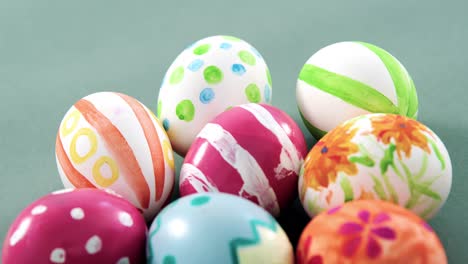 multicolored easter eggs on grey background