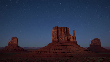 starry night sky over monument valley