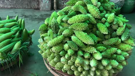 Pile-Of-Bitter-Gourd-On-Ground-In-Market