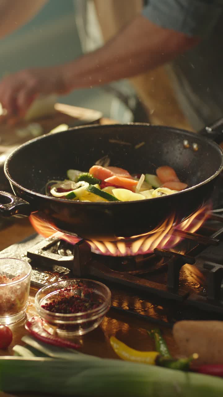 Cooking vegetables in a frying pan on a gas stove
