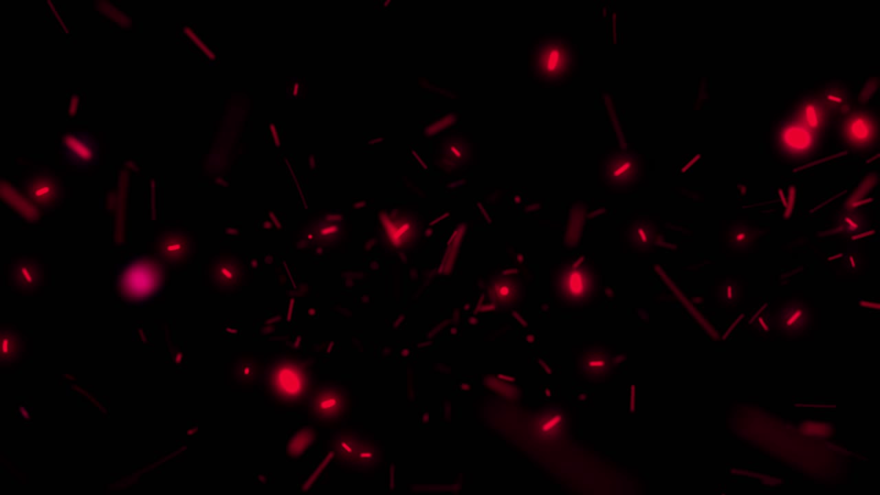 Energetic red sparks or fire embers fly towards camera on black background. Ideal for action, fire, or abstract concepts. Seamless loop