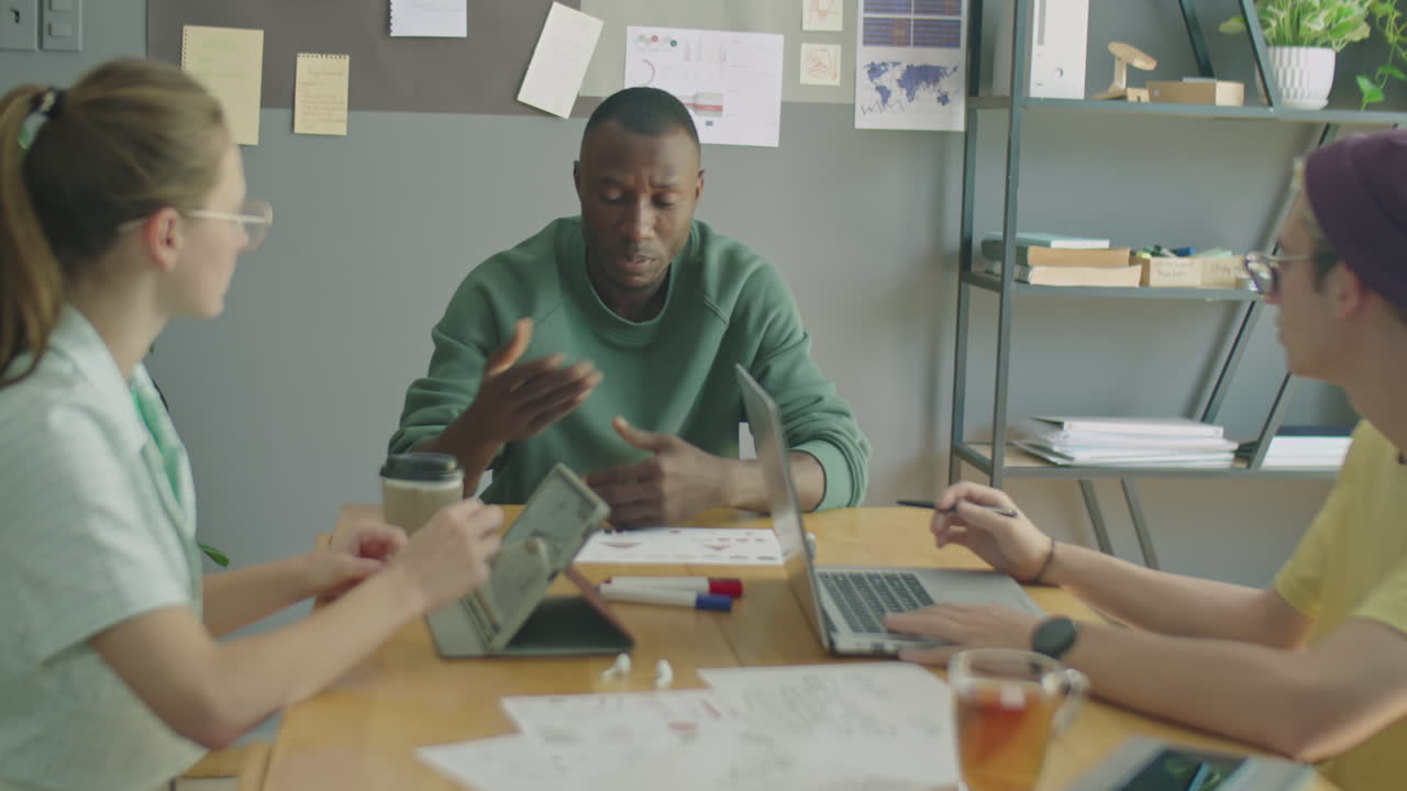 Gen Z Multiethnic Team Having Business Meeting