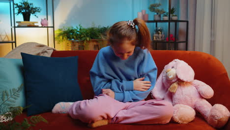 child girl laughing out loud after hearing ridiculous anecdote funny joke feeling carefree amused