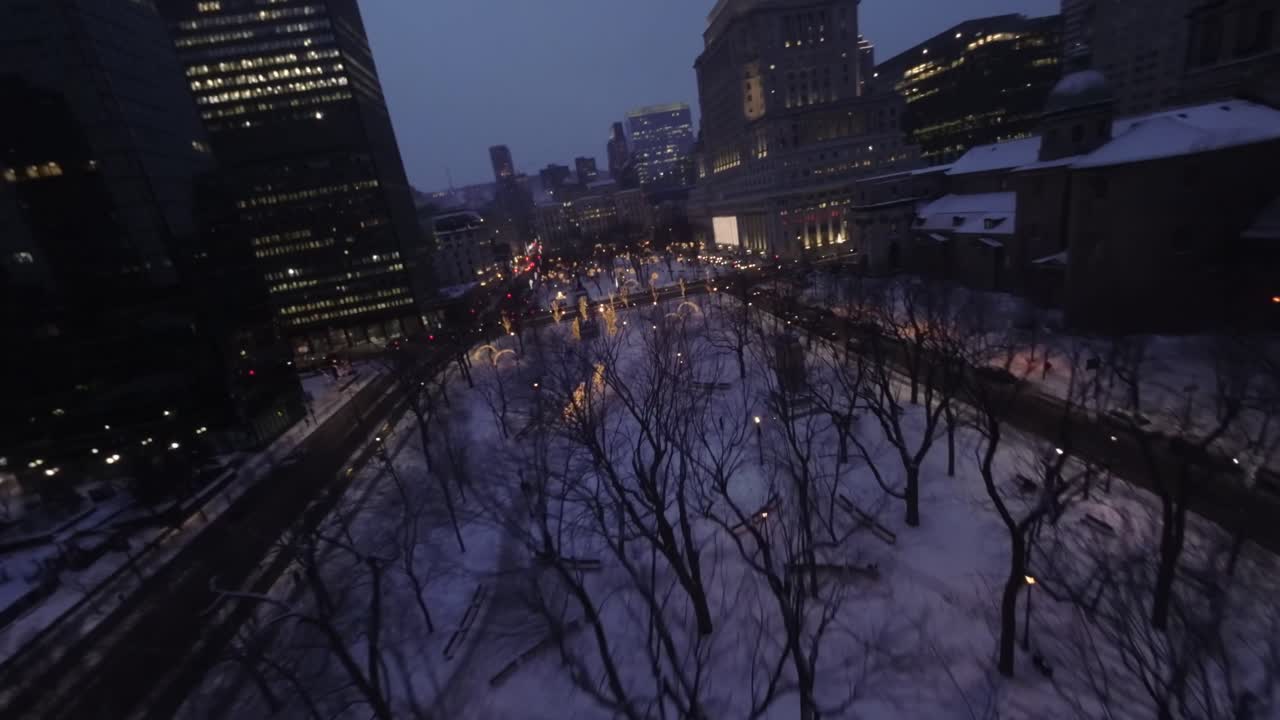 First person night view of Dorchester Square in Montreal, Canada
