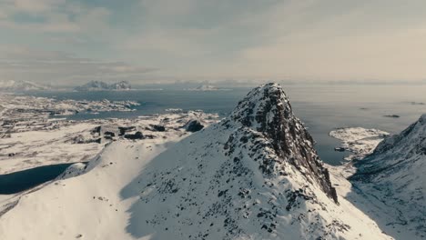 snow mountain glacier peaks in svolvaer, nordland county, norway - aerial shot