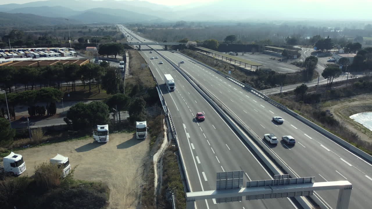 Highway Aerial View with Trucks and Cars