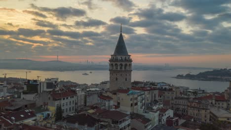 galata tower in sunrise sunlight, aerial hyperlapse drone time lapse circle shot