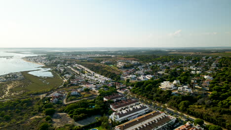 Beachfront-Buildings-In-El-Rompido,-Andalucia,-Spain-On-A-Sunny-Day