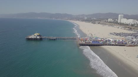 aerial drone shot of venice beach pacific park pier