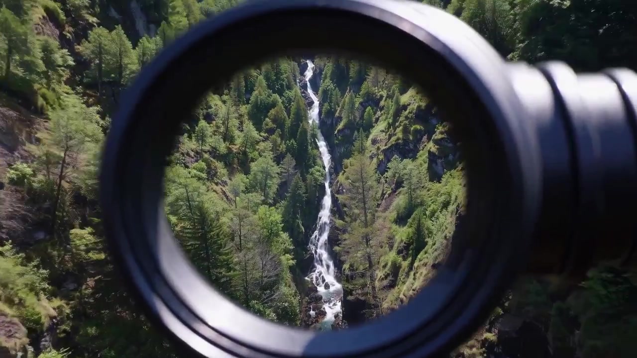 Aerial View of Waterfall Through Lens Aperture