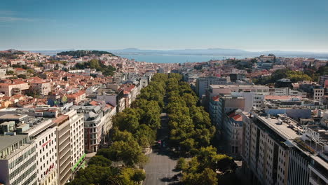 Aerial-drone-shot-of-an-big-avenue-in-downtown,-city-centre-Lisbon,-Portugal