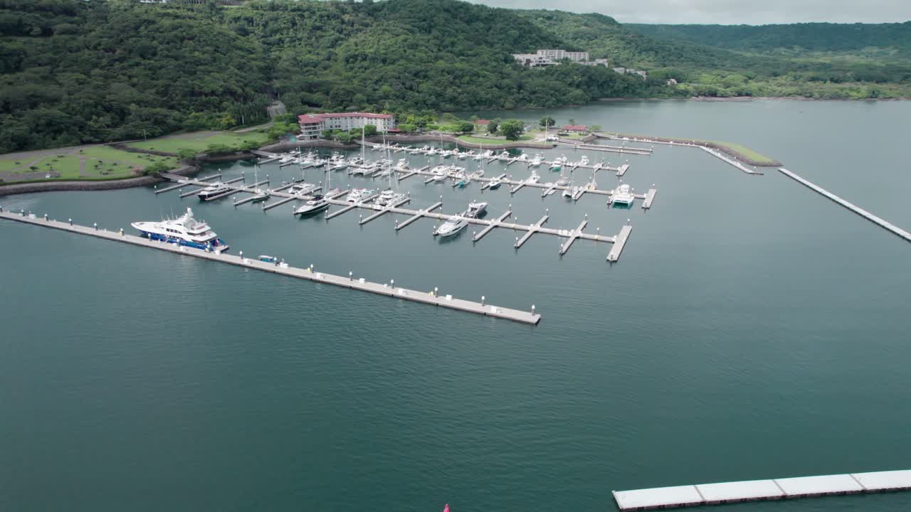 The lush green forests and the charming Papagayo marina showcase the stunning natural beauty of Costa Rica