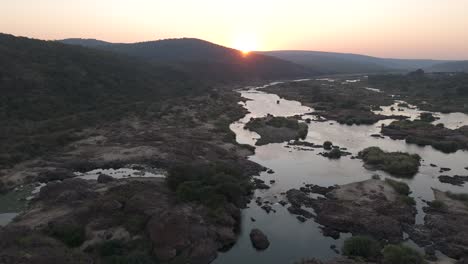 Komati-River-and-bushveld-in-early-morning-South-Africa,-wide-forward-tilt-drone-shot