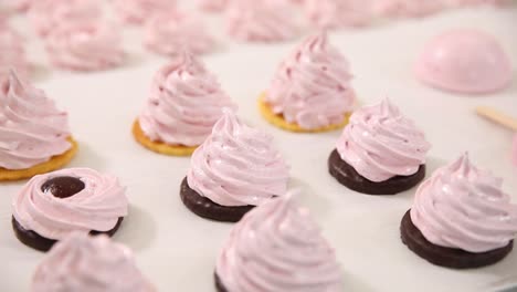 pink marshmallow treats with chocolate cookies