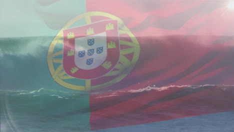 digital composition of waving portugal flag against waves in the sea