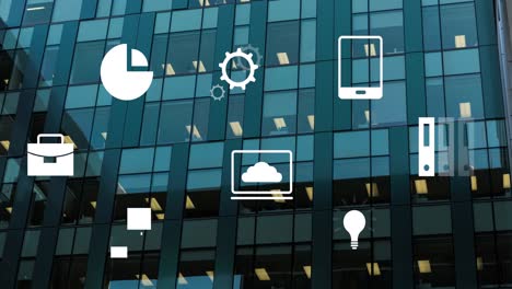 Animation-of-multiple-digital-icons-floating-against-tall-building